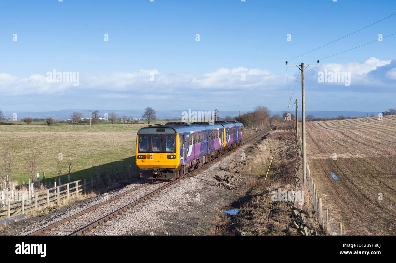 Former Northern rail class 142pacer trains 142060 + 142028 passing Hill Top on the preserved Wensleydale railway, first 142's to run in preservation Stock Photo