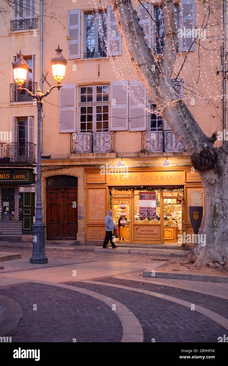 Place de la Mairie Town Square & Bicuiteriy, Biscuit Shop, Patisserie or Sweet Shop, La Cure Gourmande, at Night Aix-en-Provence Provence France Stock Photo