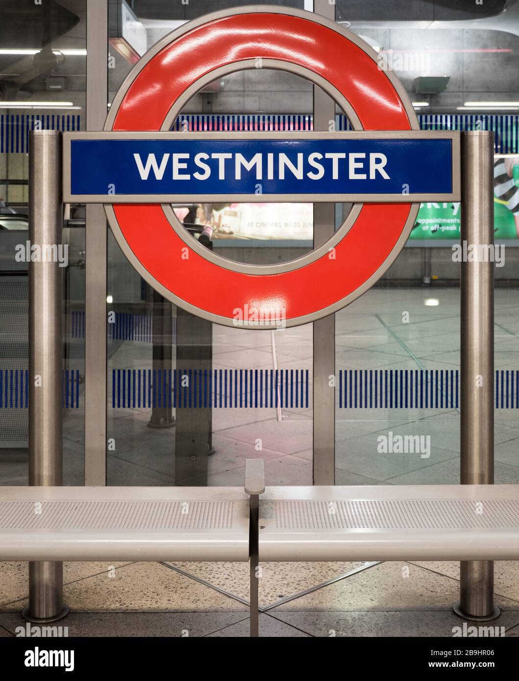 Westminster tube station sign. London Underground roundel on the