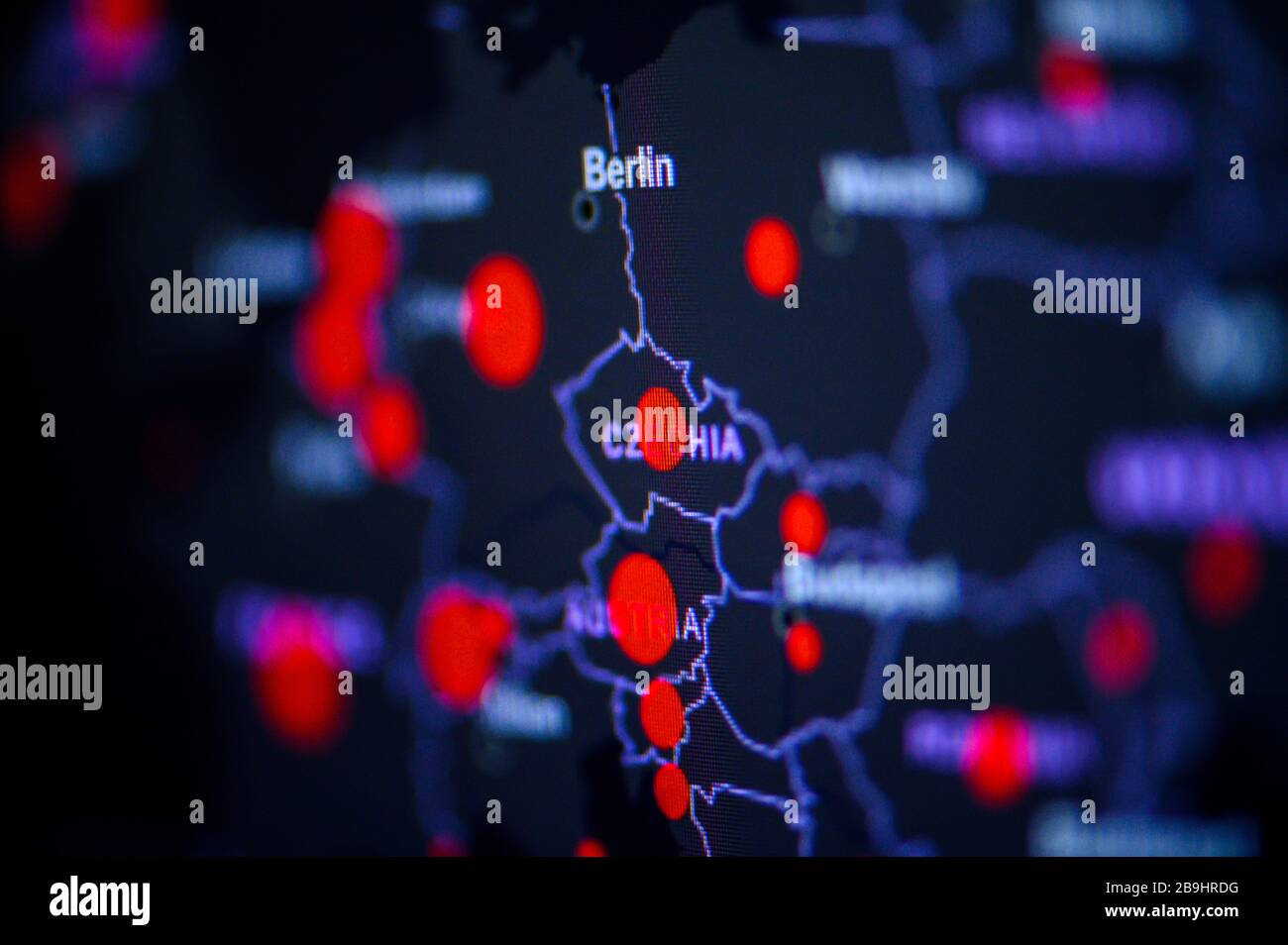 Poland, Warsaw . Coronavirus COVID-19 global cases Map. Red Dot showing the number of infected. Johns Hopkins University map on monitor display. Stock Photo