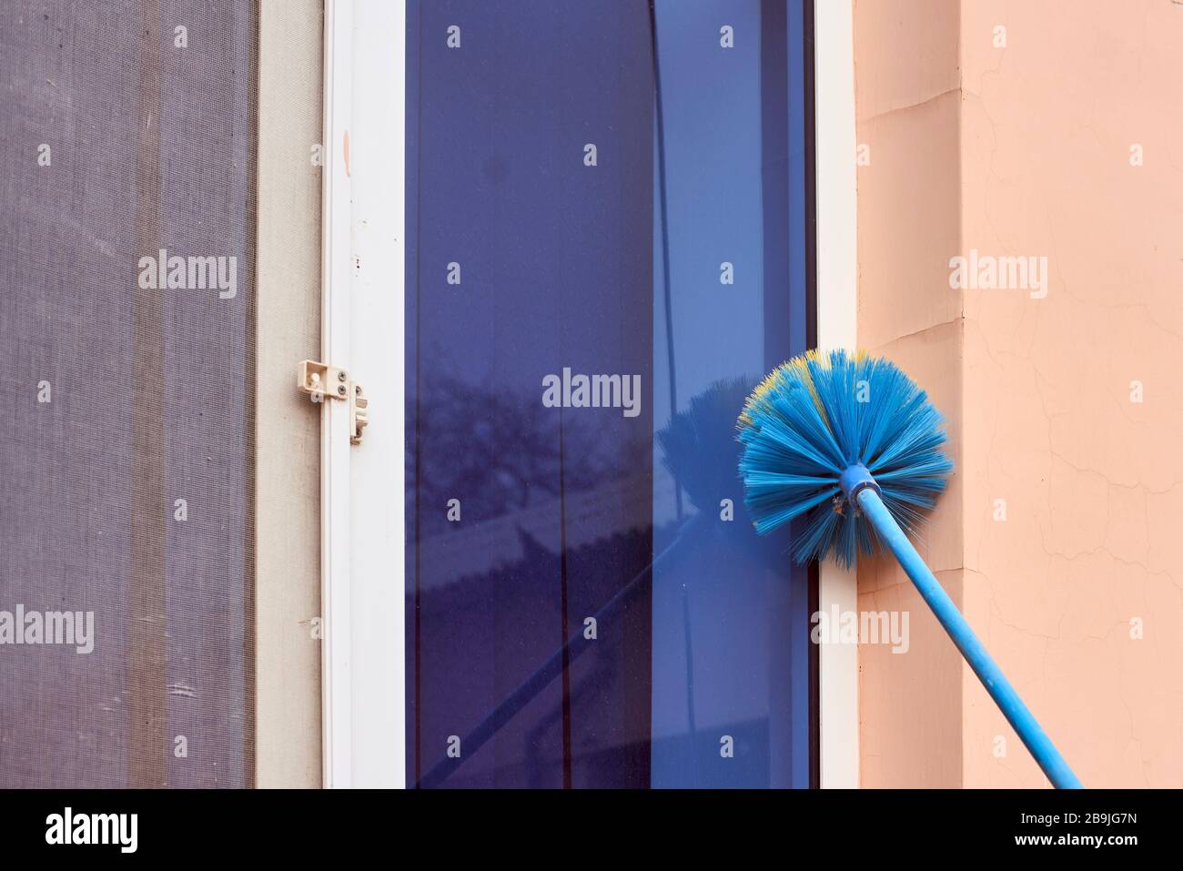 Cleaning window dust. Household Cleanup. Housekeeping jobs Stock Photo