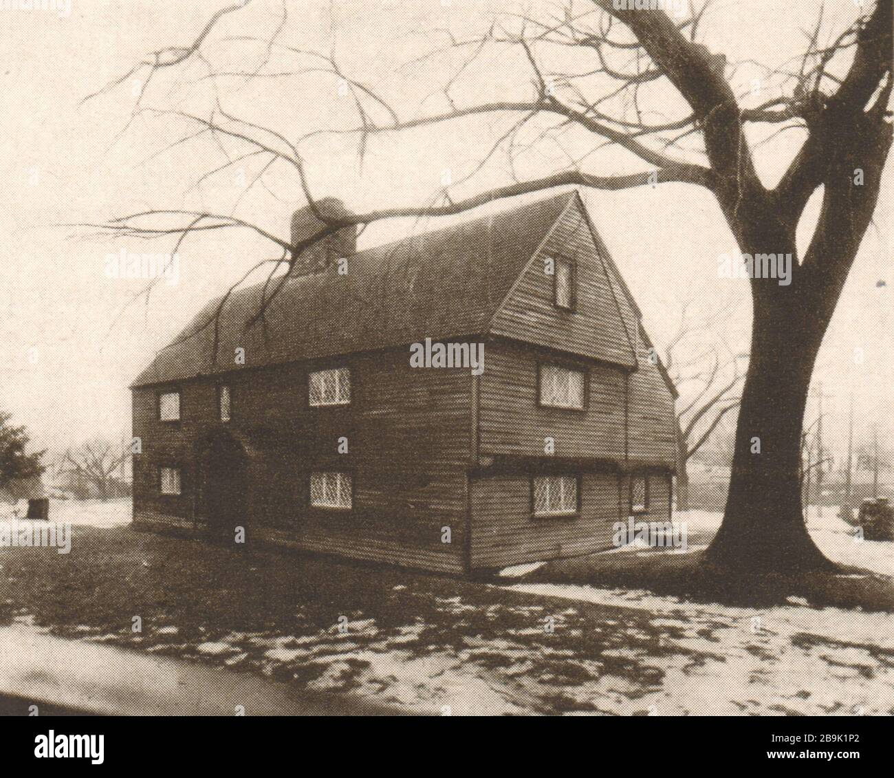 Whipple House, Ipswich, Massachusetts, with end overhand (''Hewn overhang''), beautifully moulded. Ink line indicates original silhouette.  (1922) Stock Photo