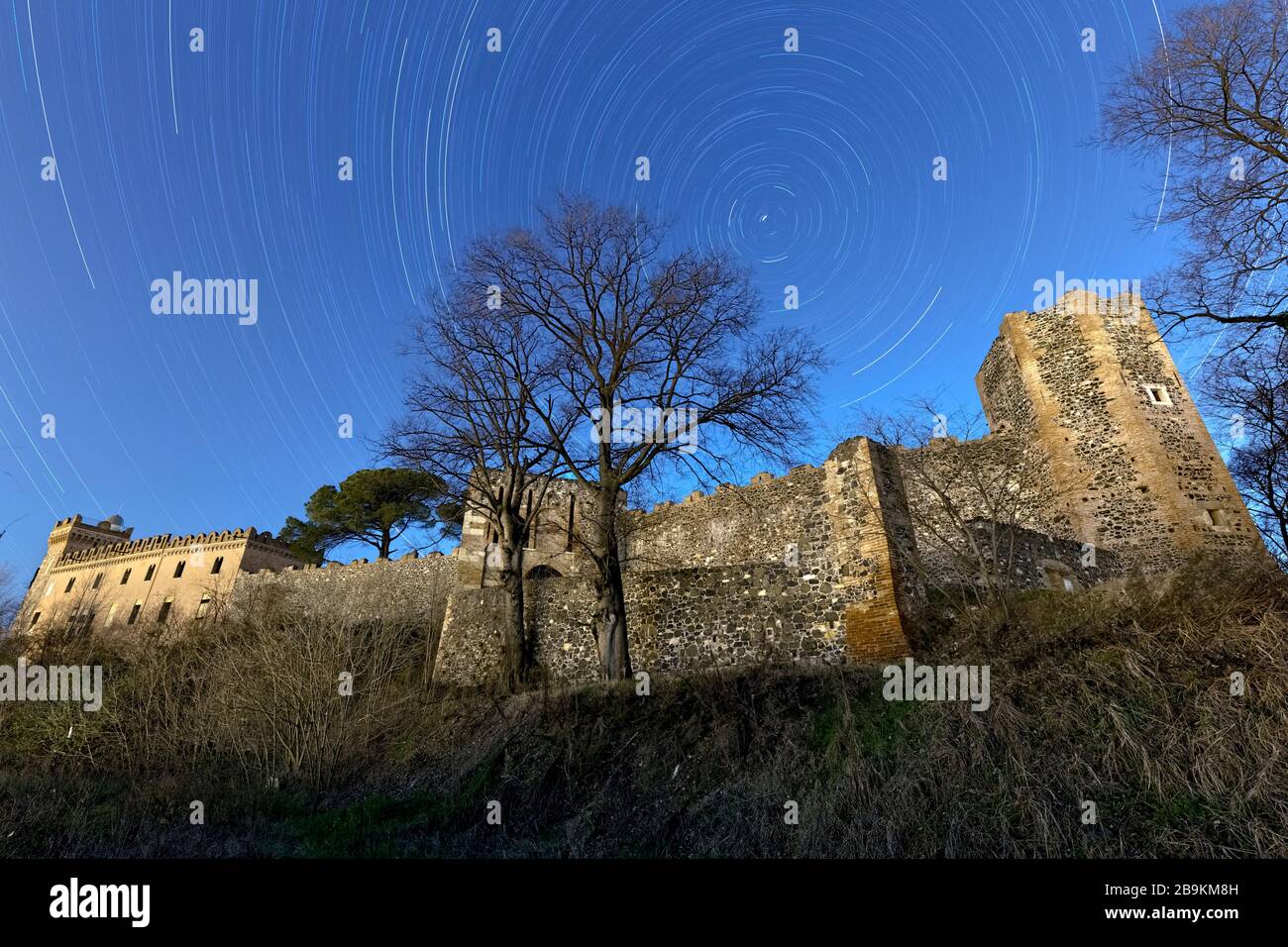 Star trails above the Maltraverso castle in Montebello Vicentino. Vicenza province, Veneto, Italy, Europe. Stock Photo