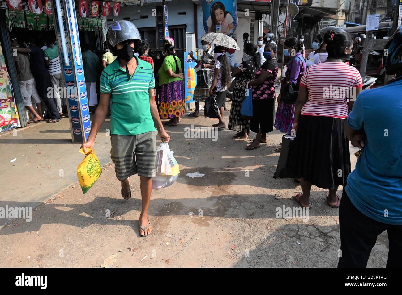 Colombo Sri Lanka 24th Mar 2020 Customers Queue Up To Do Shopping Outside A Store When A Curfew Is Lifted Temporarily For People To Re Stock On Essential Items In Colombo Sri Lanka