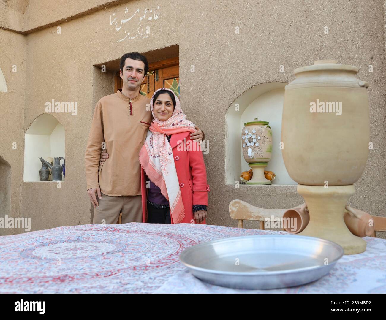Portrait of a young Iranian couple that run a guesthouse in the village of Kavirabad , Varamin, Tehran province, Iran, Middle East Stock Photo