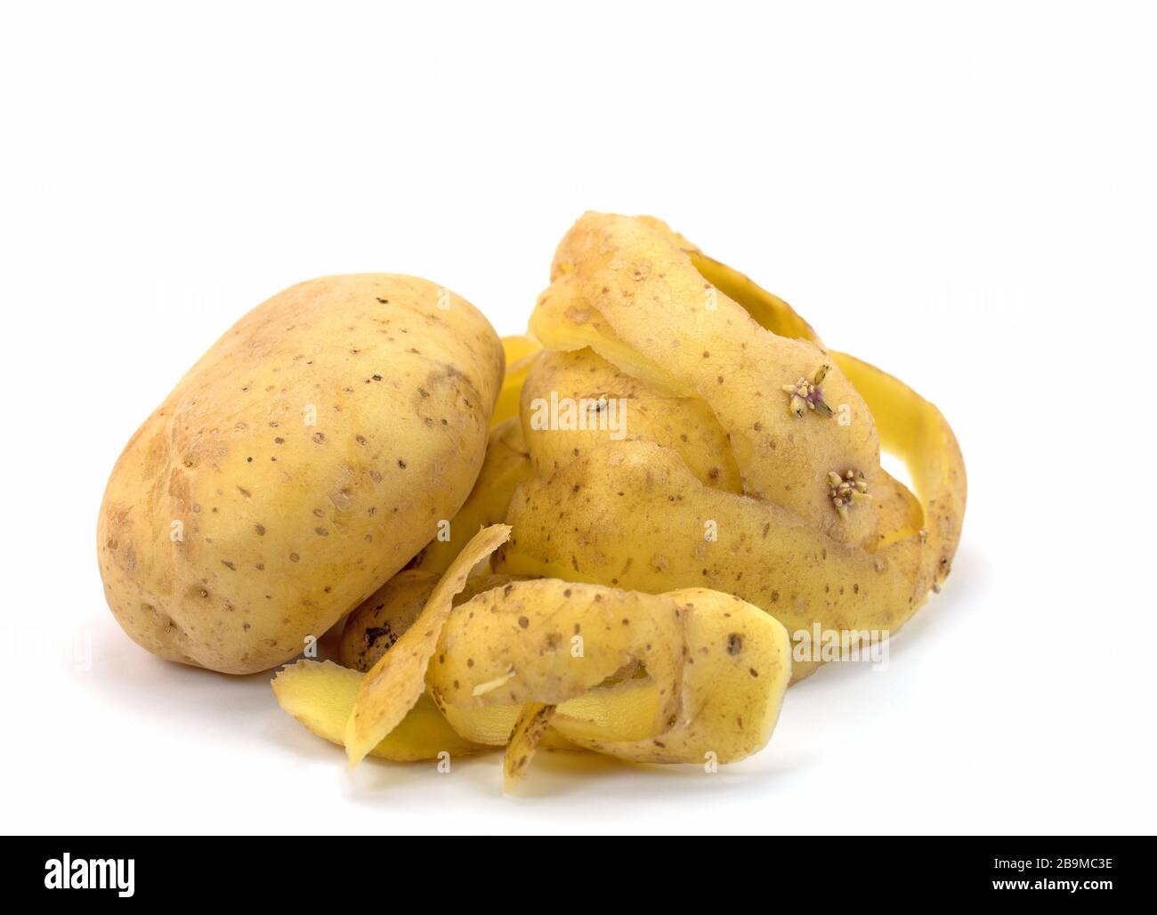 Potato peel against white background Stock Photo