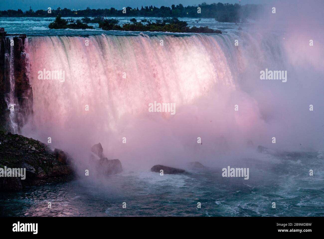 Colorful light shedding on the Niagara Falls Stock Photo