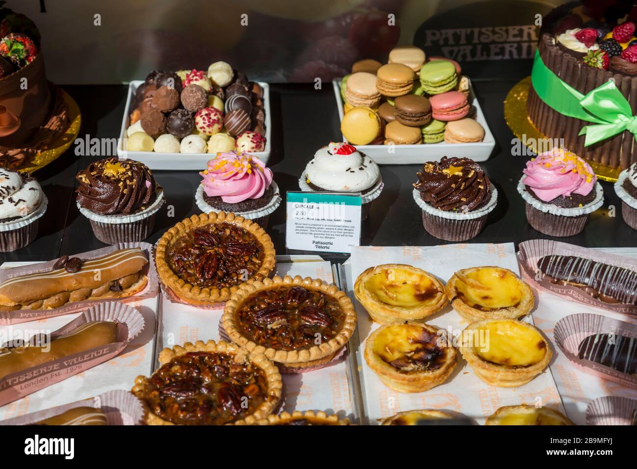 Patisserie Valerie Cafe window display with cakes in Glasgow city