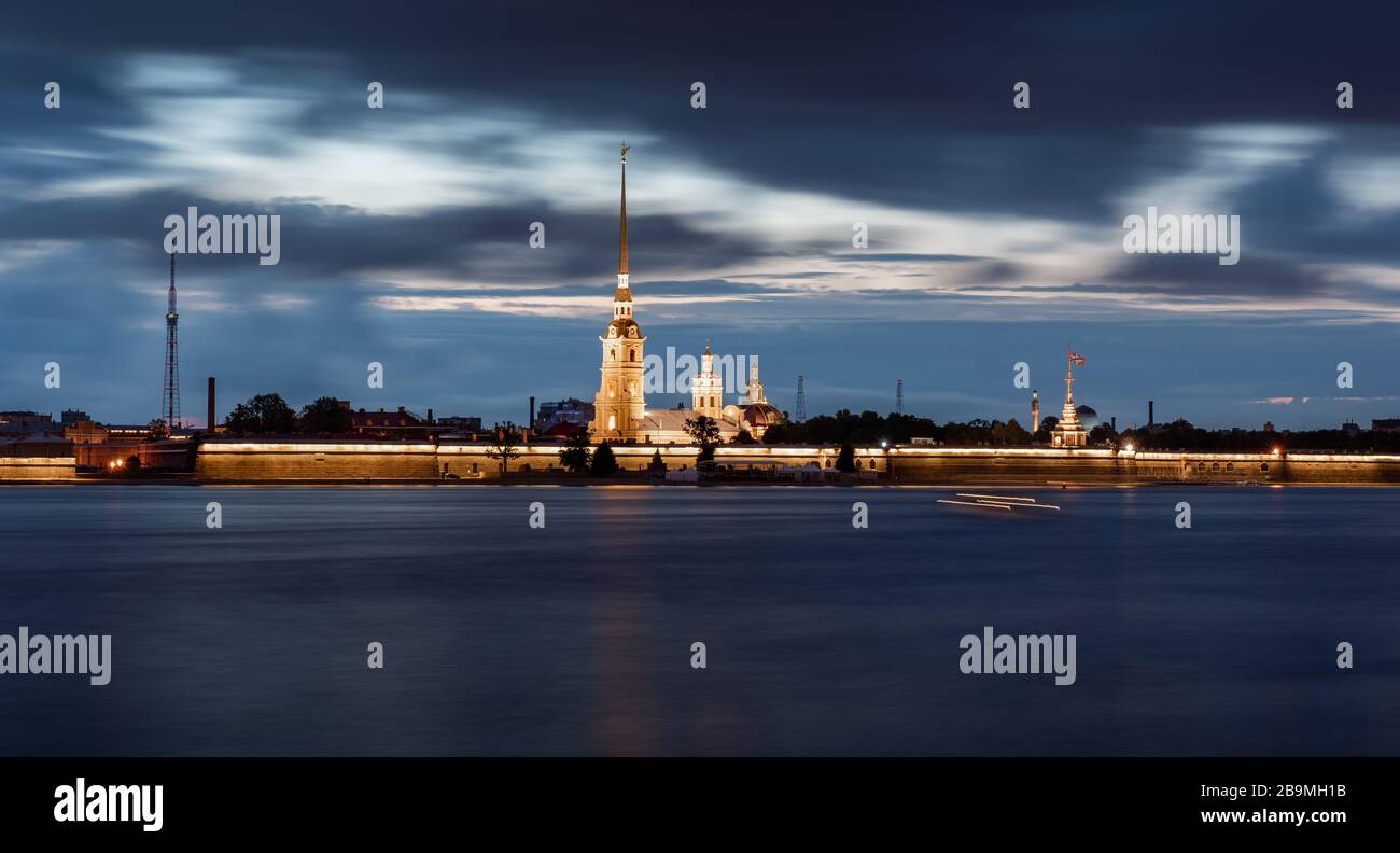 Thunderstorm clouds over The Peter and Paul fortress and Neva river during so called white nights season. It is famous landmark of St Petersburg city, Stock Photo