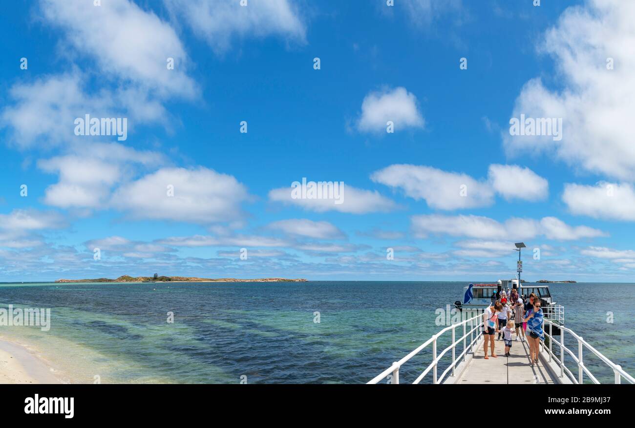 Jetty and Penguin Island Ferry with Penguin Island in the distance, Rockingham, Western Australia, Australia Stock Photo