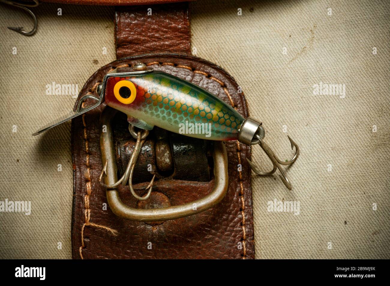 An example of a vintage fishing lure equipped with treble hooks