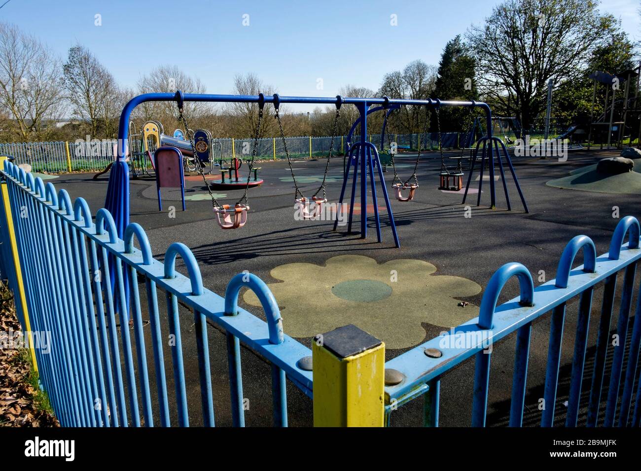 A local authority children's playground is padlocked to prevent entry under the UK Government's social distancing enforcement measures. Stock Photo