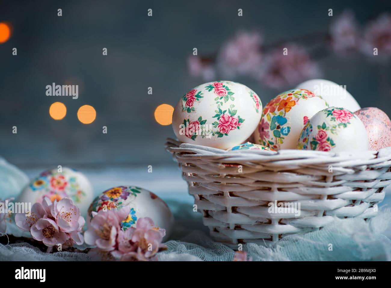 Decoupage decorated Easter eggs with cherry blossom flowers Stock Photo