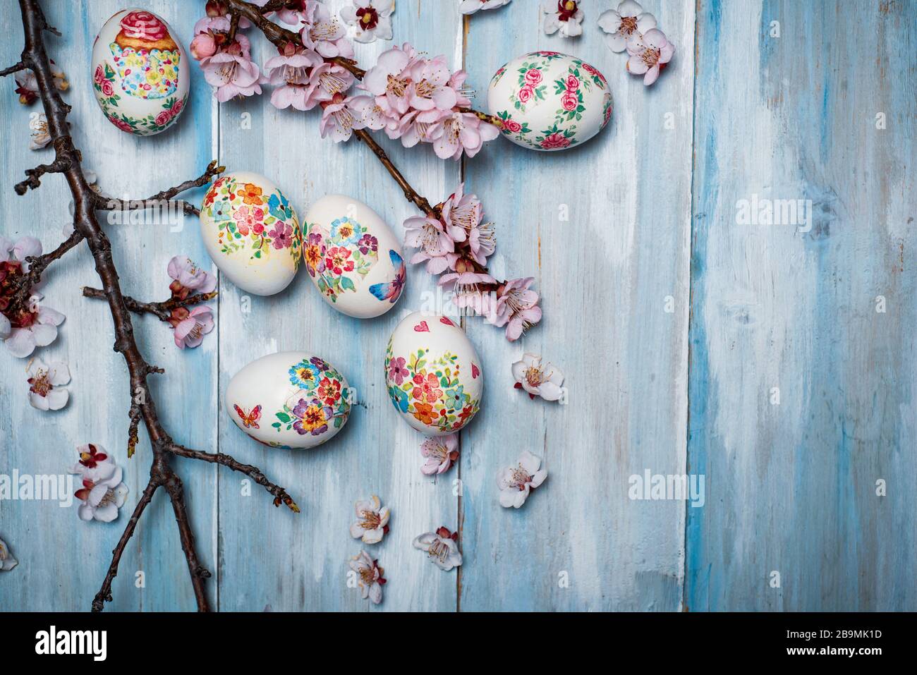 Decoupage decorated Easter eggs with cherry blossom flowers Stock Photo