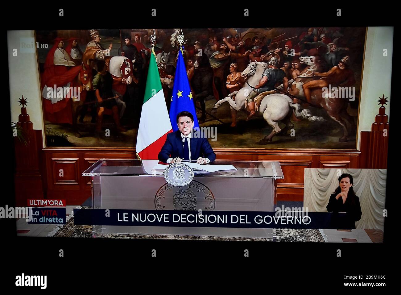 Turin, Italy. 24th Mar, 2020. TURIN, ITALY - March 24, 2020: The Rai 1 TV channel broadcasts the video press conference of the Italian premier Giuseppe Conte while announcing new measures for the coronavirsu emergency. The Italian government imposed unprecedented restrictions to halt the spread of COVID-19 coronavirus outbreak, among other measures people movements are allowed only for work, for buying essential goods and for health reasons. (Photo by Nicolò Campo/Sipa USA) Credit: Sipa USA/Alamy Live News Stock Photo