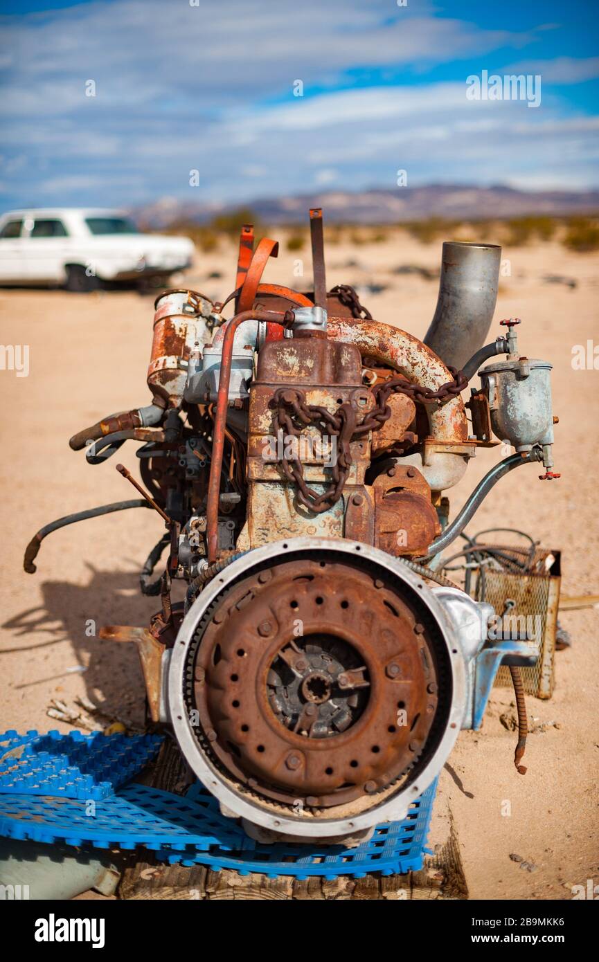 Old rusty engine in a Mojave desert junkyard Stock Photo Alamy