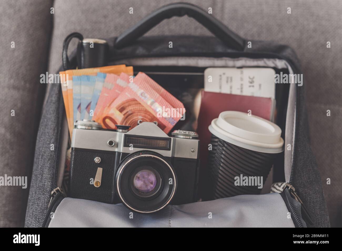 Backpack with things needed for travel Stock Photo