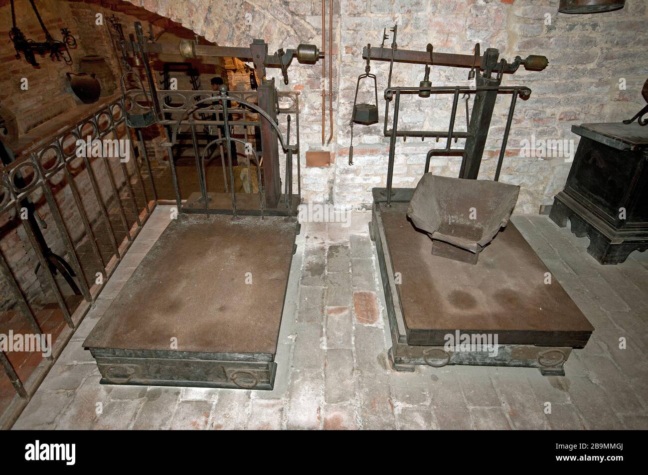 Ancient platform scales in the Underground City of Ercolani Cellar, Montepulciano, Tuscany, Italy Stock Photo