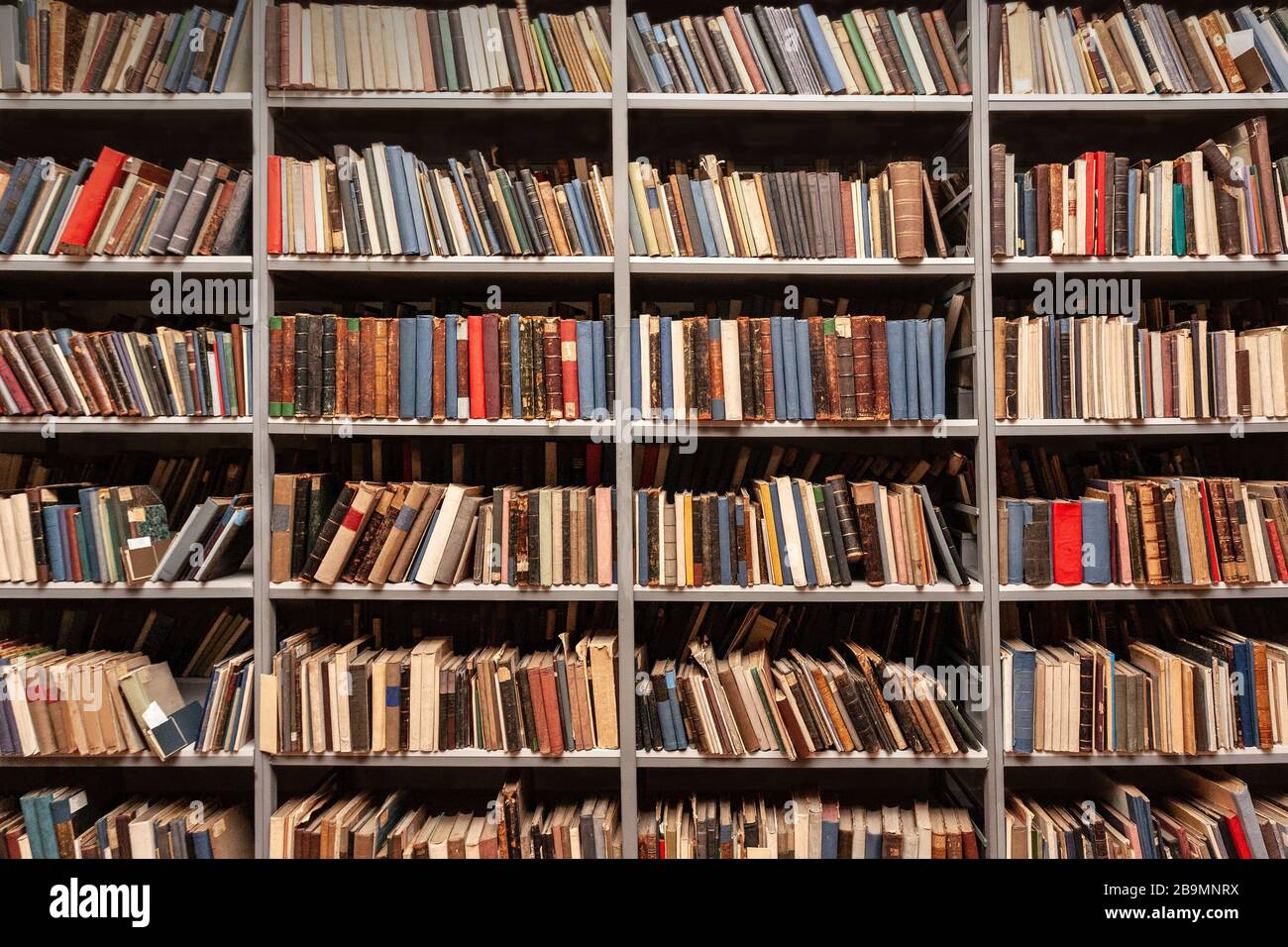View of shelves with old books in library Stock Photo Alamy