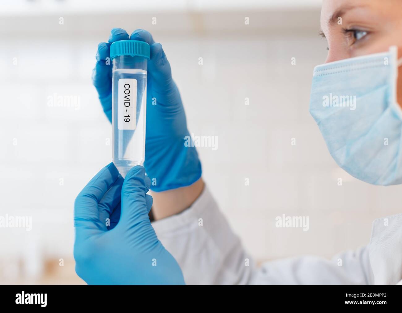 Female Scientist Medical Research Lab researching test tubes virus ...
