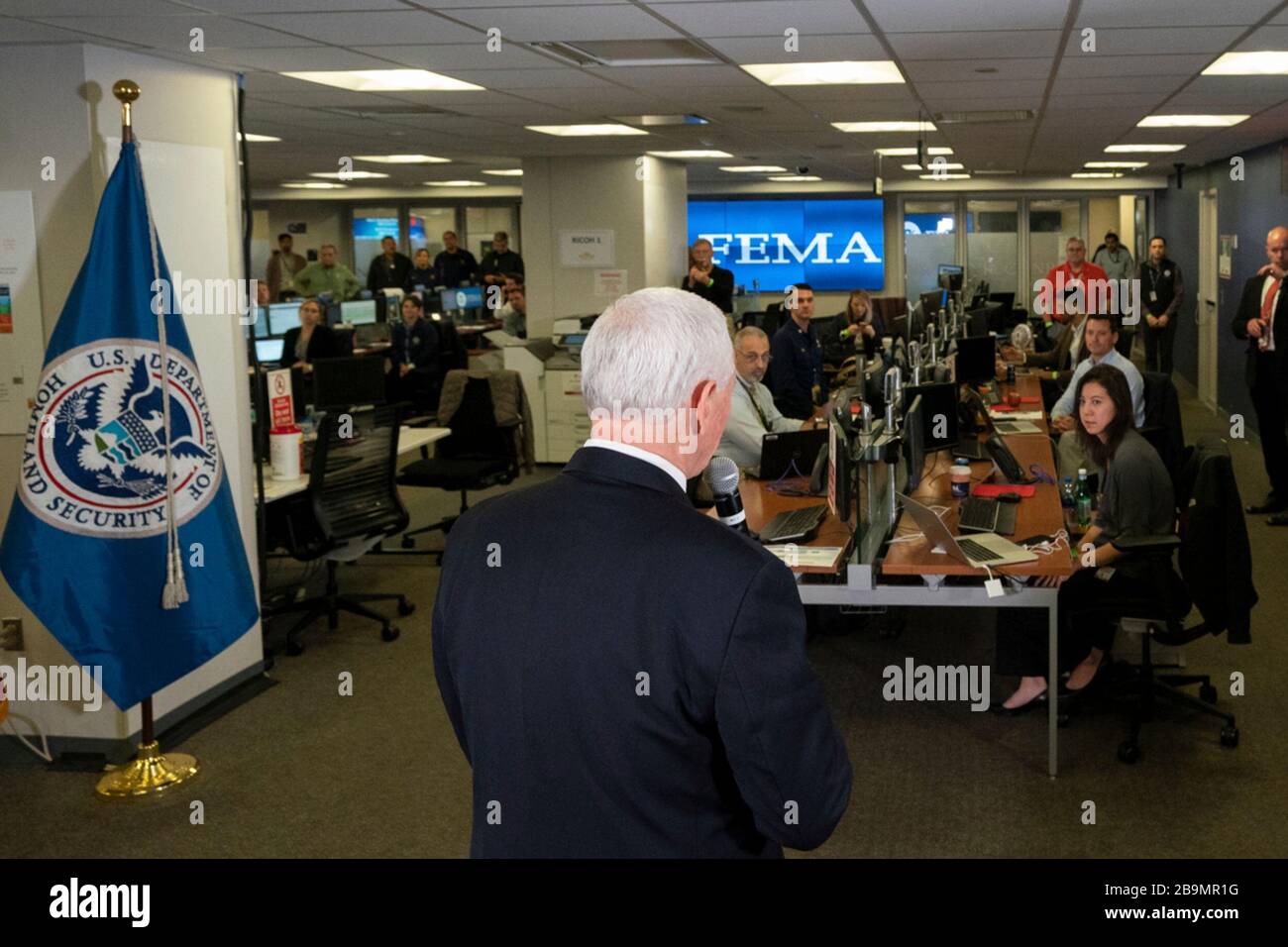 Washington, United States of America. 23 March, 2020. U.S Vice President Mike Pence speaks with FEMA staff at the Federal Emergency Management Agency Headquarters March 23, 2020 in Washington, DC.  Credit: D.Myles Cullen/White House Photo/Alamy Live News Stock Photo