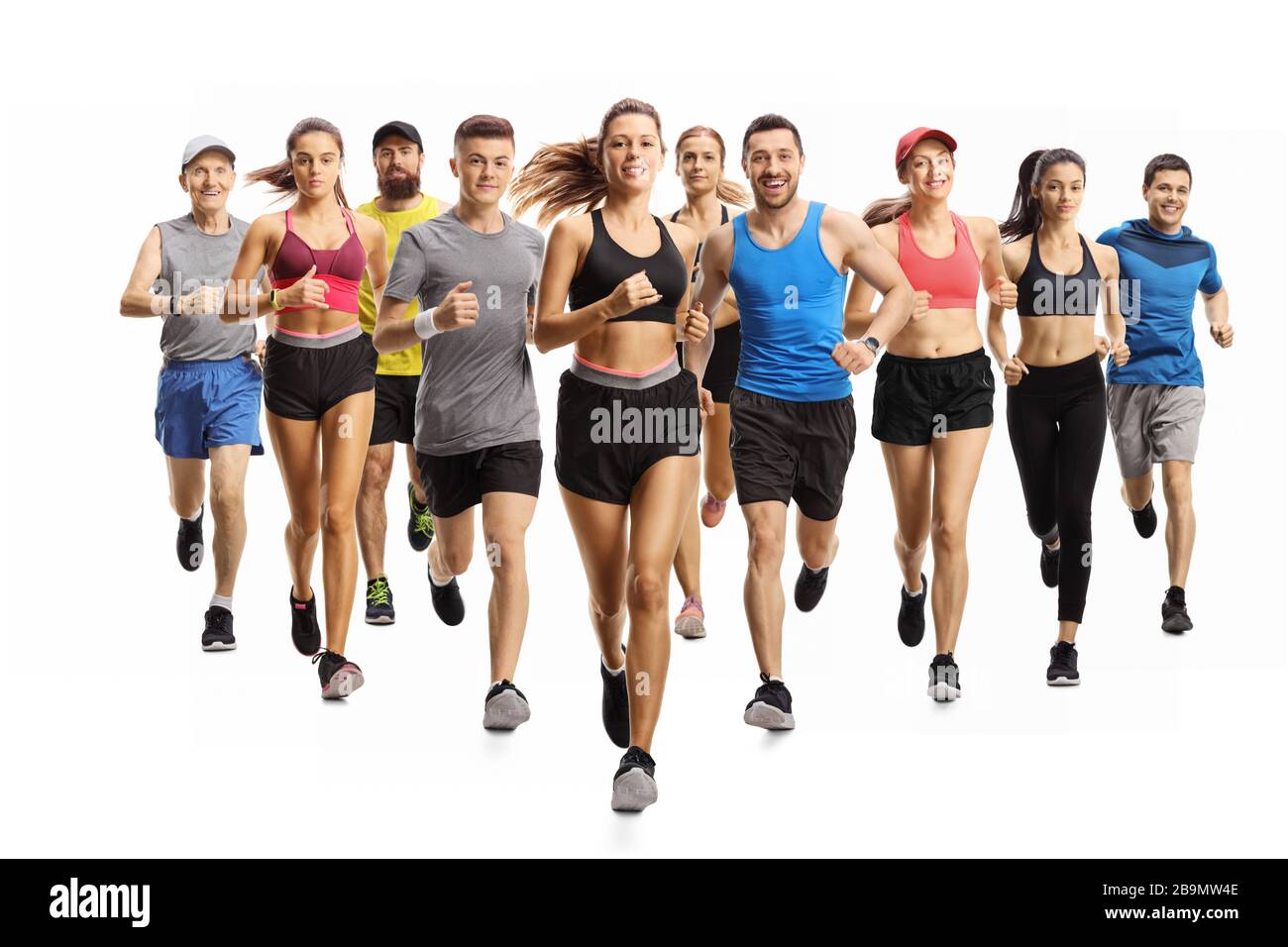 Full length portrait shot of many young and older people running in sportswear isolated on white background Stock Photo