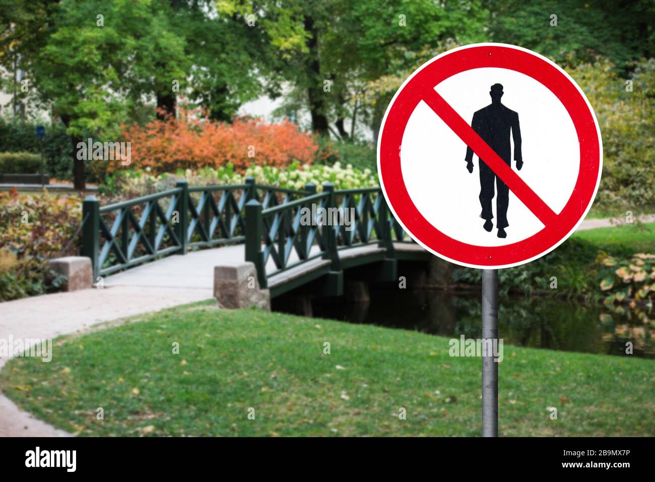 Prohibition sign of people walking. Quarantine self-isolation Stock Photo