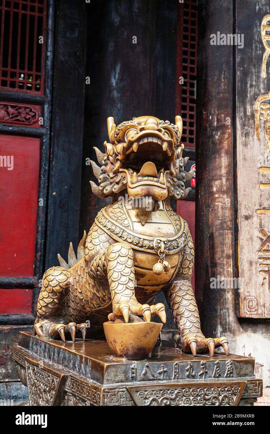 Chinese bronze guardian lion in Qingyang Palace Buddhist Temple Wenshu Monastery Chengdu China Stock Photo