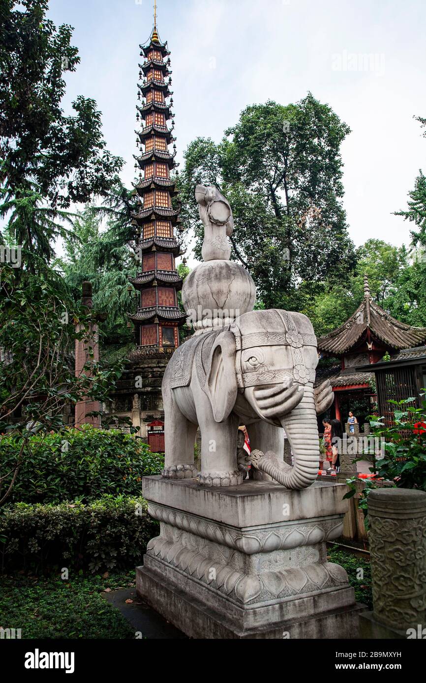 Elephant statue beside pagoda in Qingyang Palace Buddhist Temple Wenshu Monastery Chengdu China Stock Photo