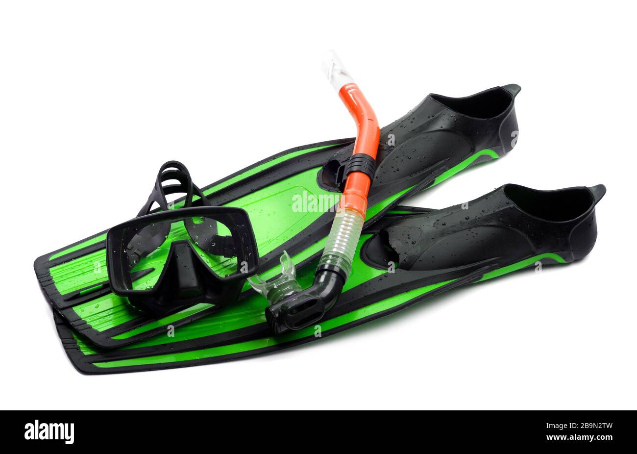 Mask, red snorkel and flippers of light green color with water drops