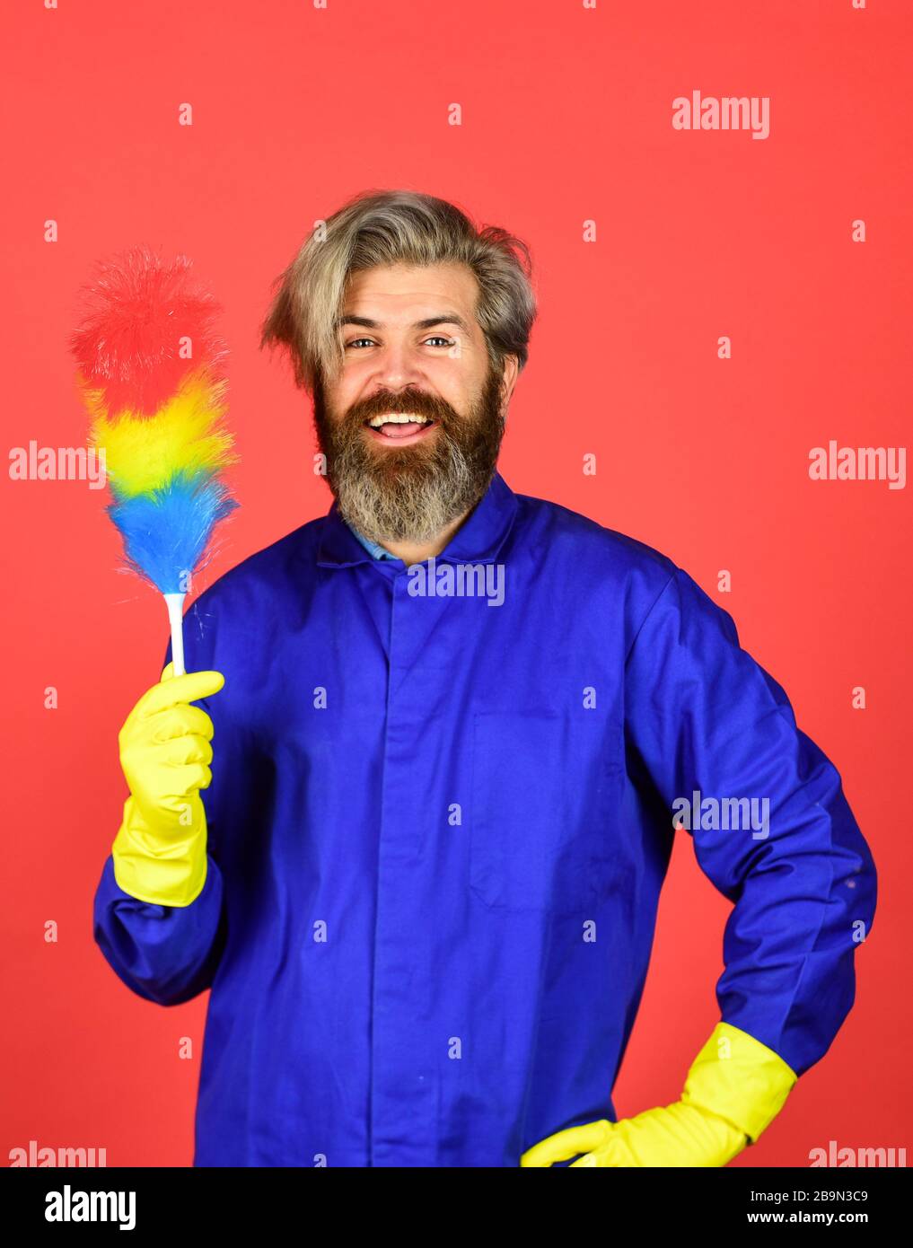 Polypropylene duster. Hipster holding cleaning tool. Cleaning home ...