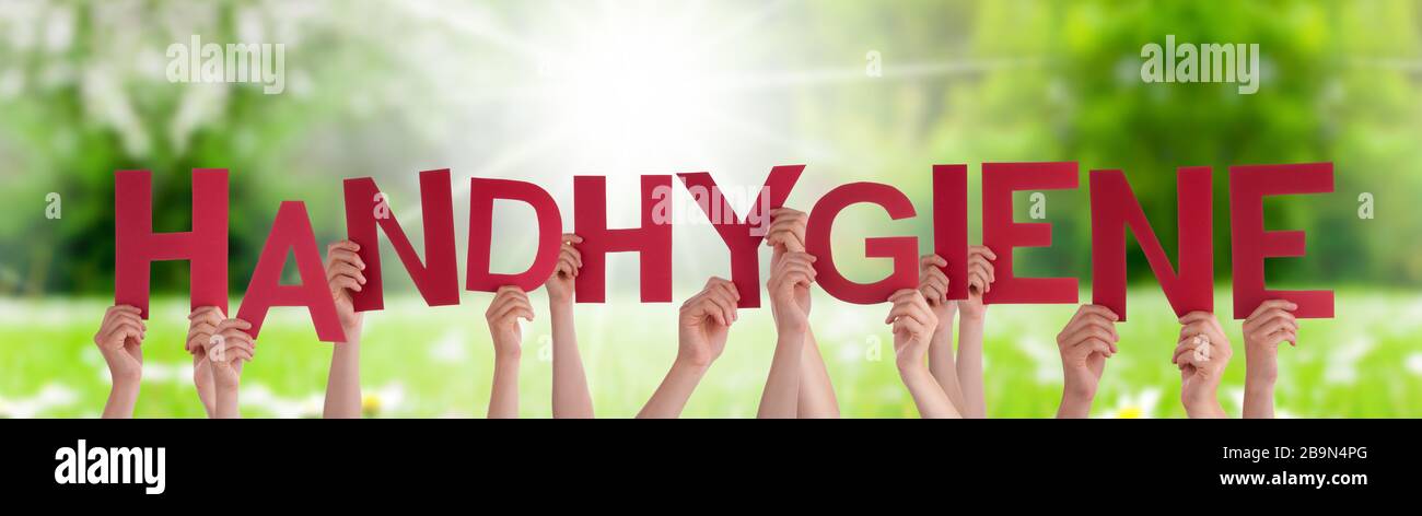 People Hands Holding Word Handhygiene Means Hand Hygiene, Grass Meadow Stock Photo