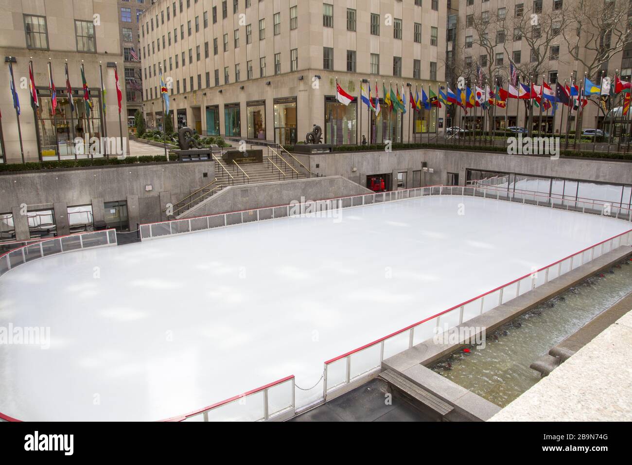 The ice skating rink and the plaza at Rockefeller Center are totally empty  due to the Coronavirus spread in New York City. Stock Photo