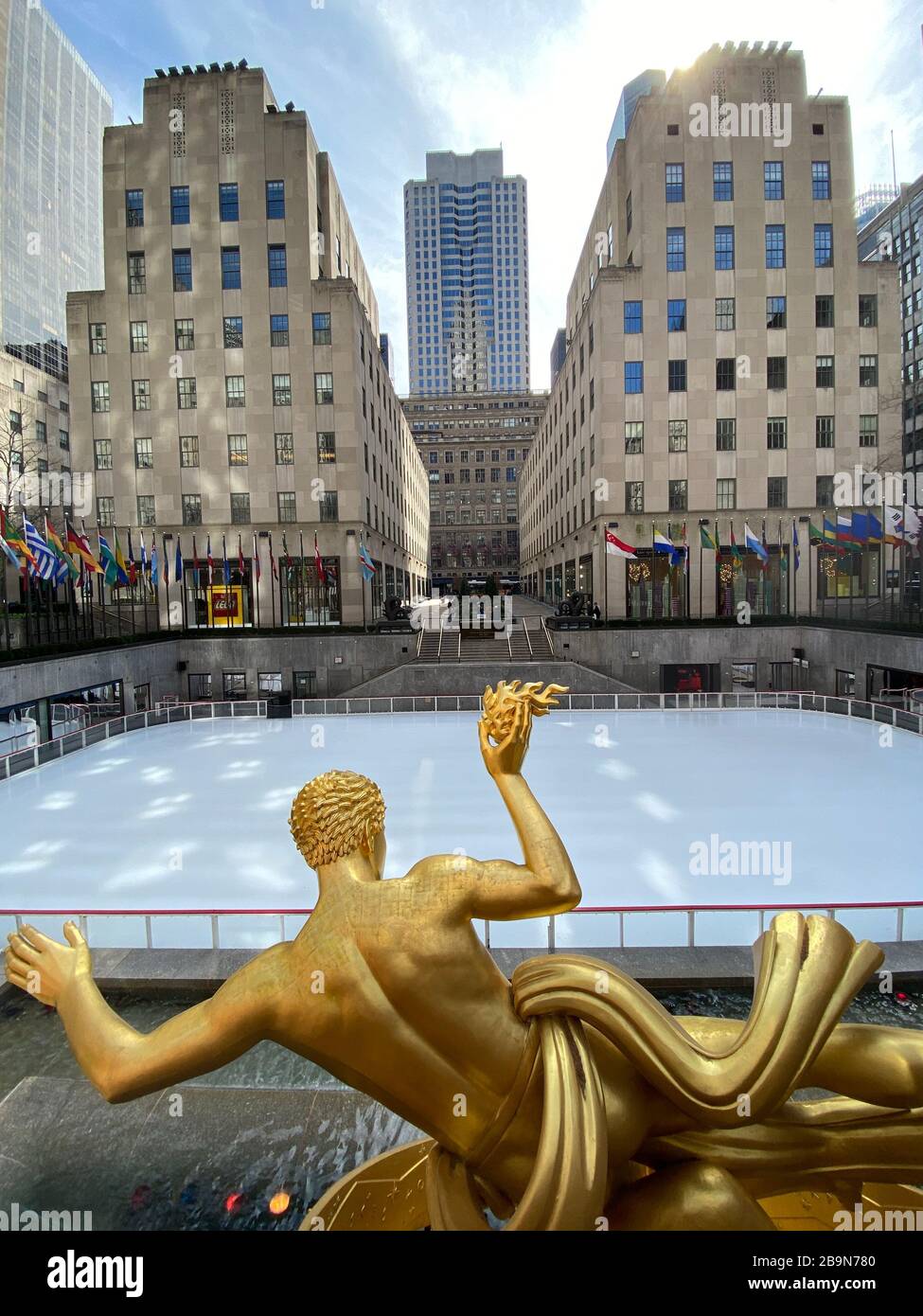The ice skating rink and the plaza at Rockefeller Center are totally empty  due to the Coronavirus spread in New York City. Stock Photo