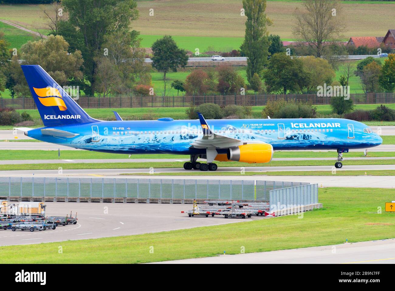 Icelandair Boeing 757 with colorful special livery for Vatnajökull Glacier. Airplane registered as TF-FIR arriving in Zurich Kloten Airport. Stock Photo