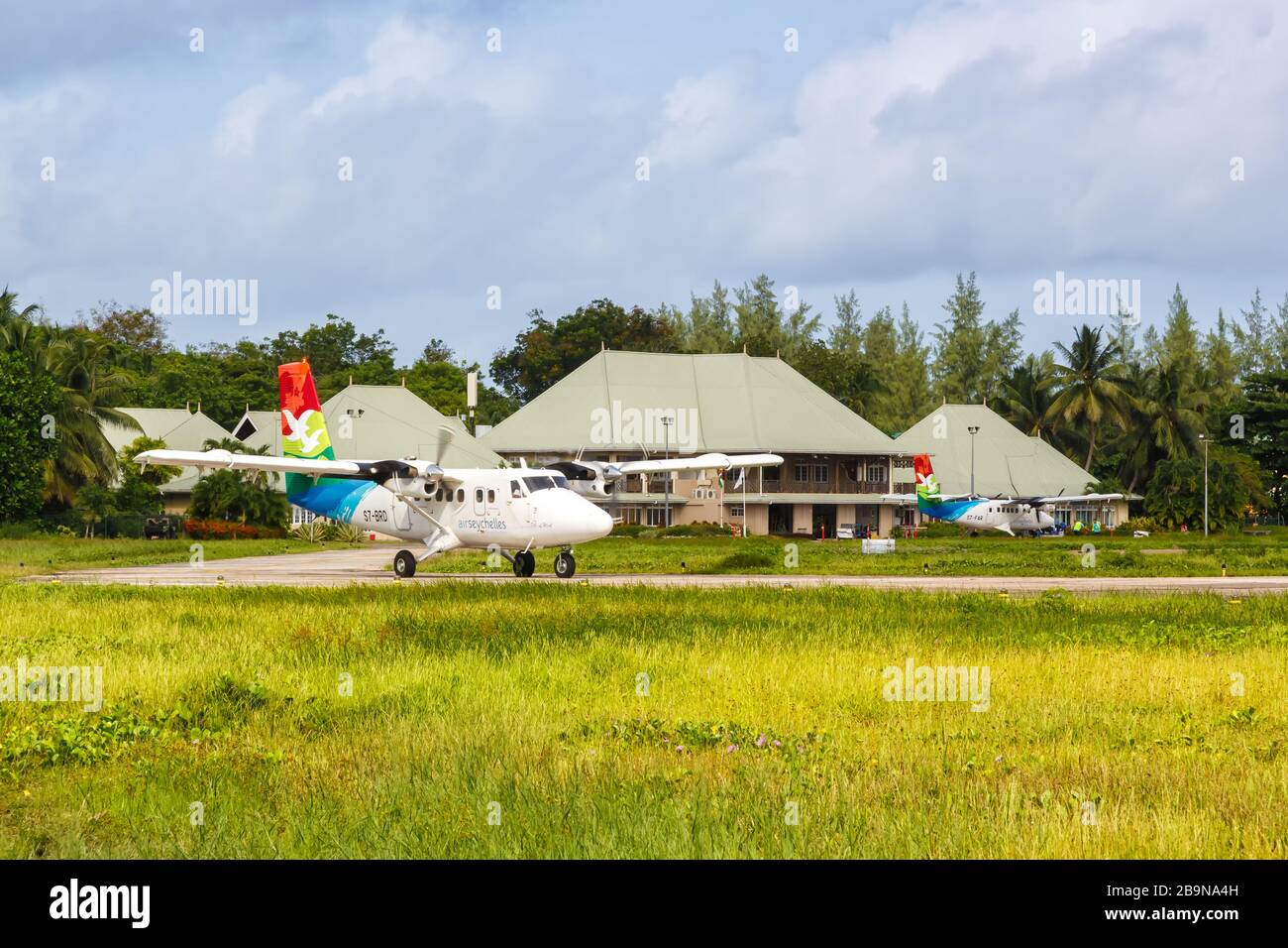 Praslin, Seychelles – February 7, 2020: Air Seychelles DHC-6-400 Twin Otter airplane at Praslin airport (PRI) in the Seychelles. Stock Photo