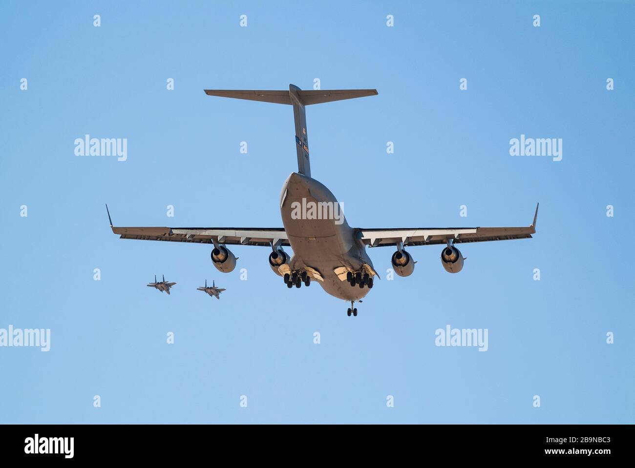 A USAF C-17 flying overhead as it lands at Nellis Air Force base is ...