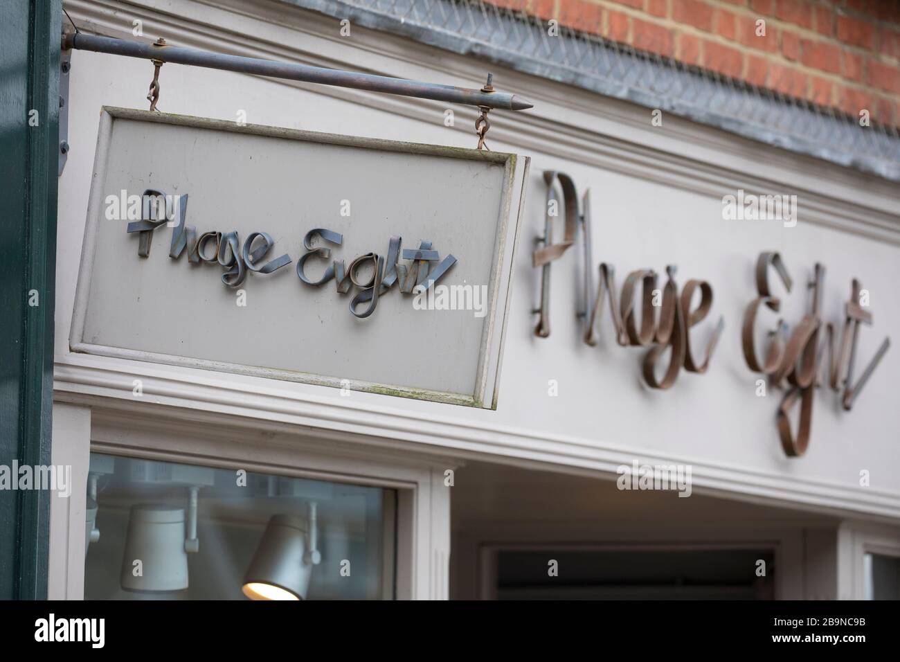 A sign sits above a Phase Eight clothing store in Guildford, Surrey U.K.Friday, March 20, 2020 Stock Photo