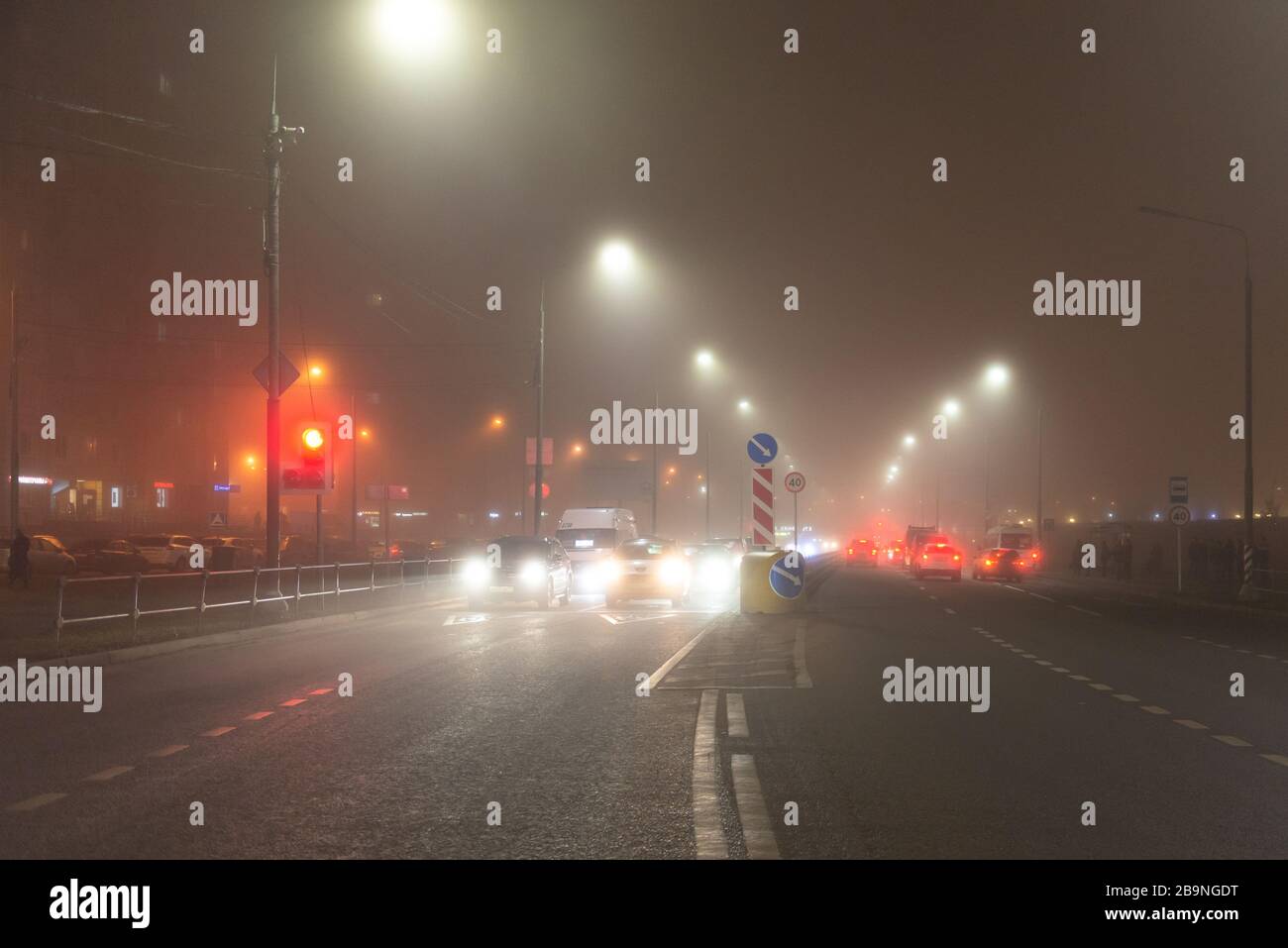 Car at night headlight glare hires stock photography and images Alamy