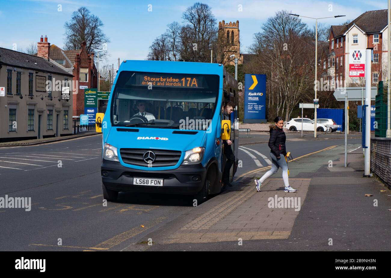 Blue coloured bus at stop near ringroad. Stourbridge. West Midlands Stock Photo