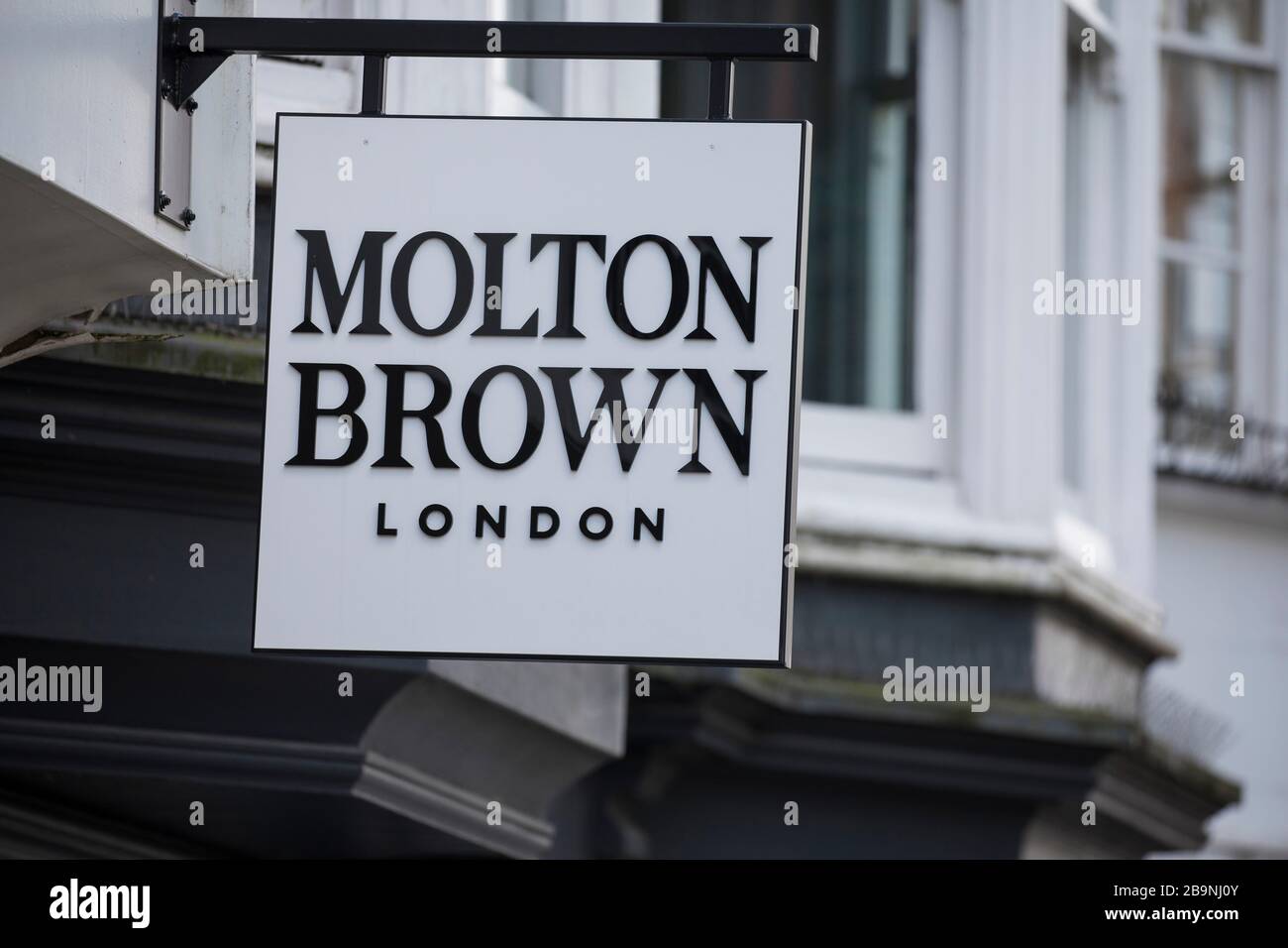 A sign sits above a Molton Brown shop in Guildford, Surrey U.K.Friday, March 20, 2020 Stock Photo