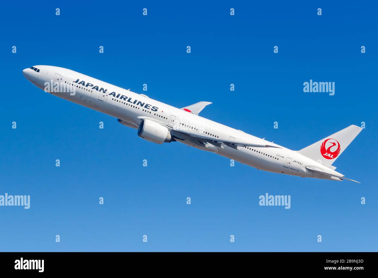 New York City, New York – March 1, 2020: Japan Airlines Boeing 777-300ER airplane at New York JFK airport (JFK) in New York. Boeing is an American air Stock Photo