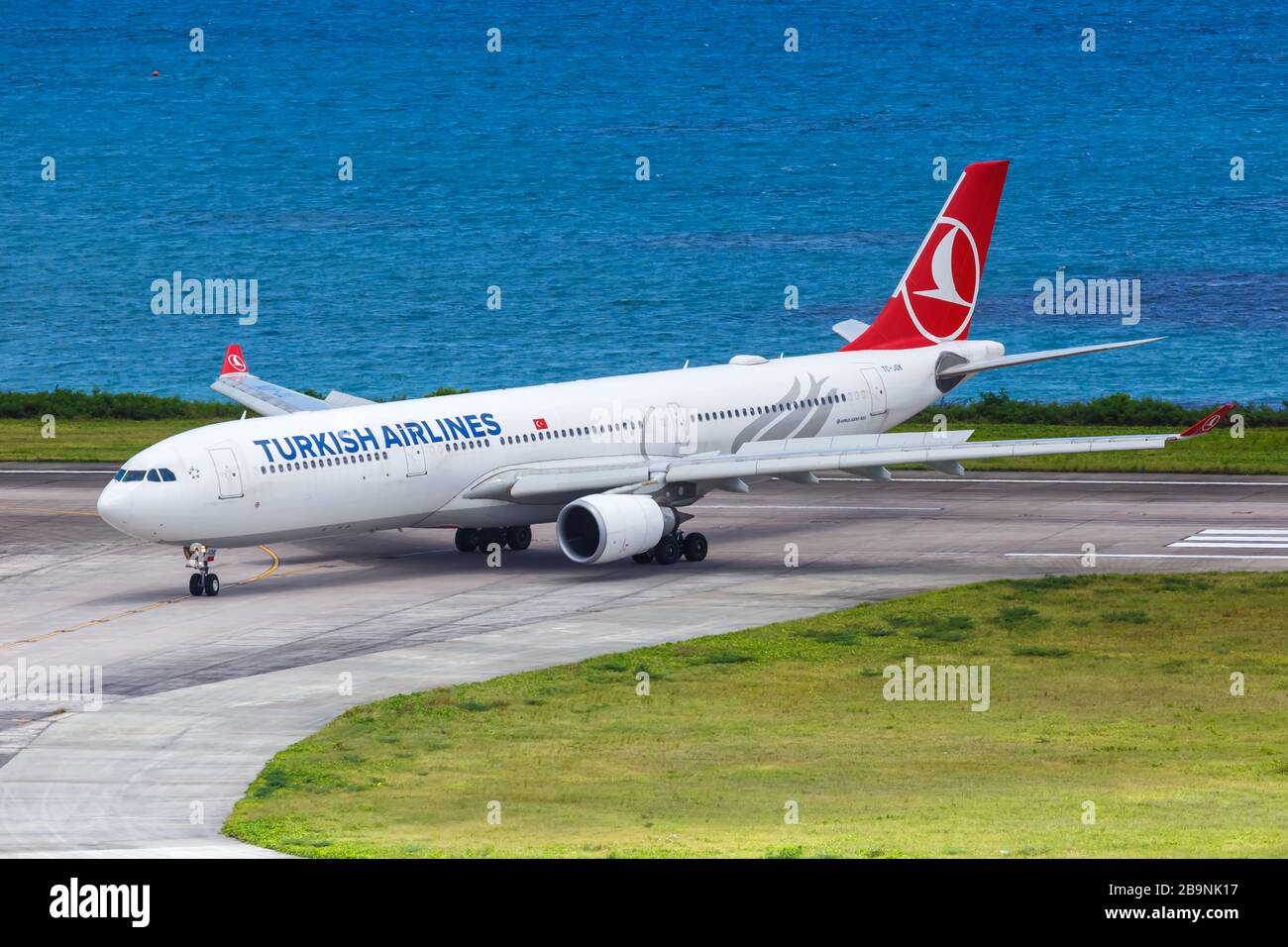 Mahe, Seychelles – February 8, 2020: Turkish Airlines Airbus A330 airplane at Mahe airport (SEZ) in the Seychelles. Airbus is a European aircraft manu Stock Photo