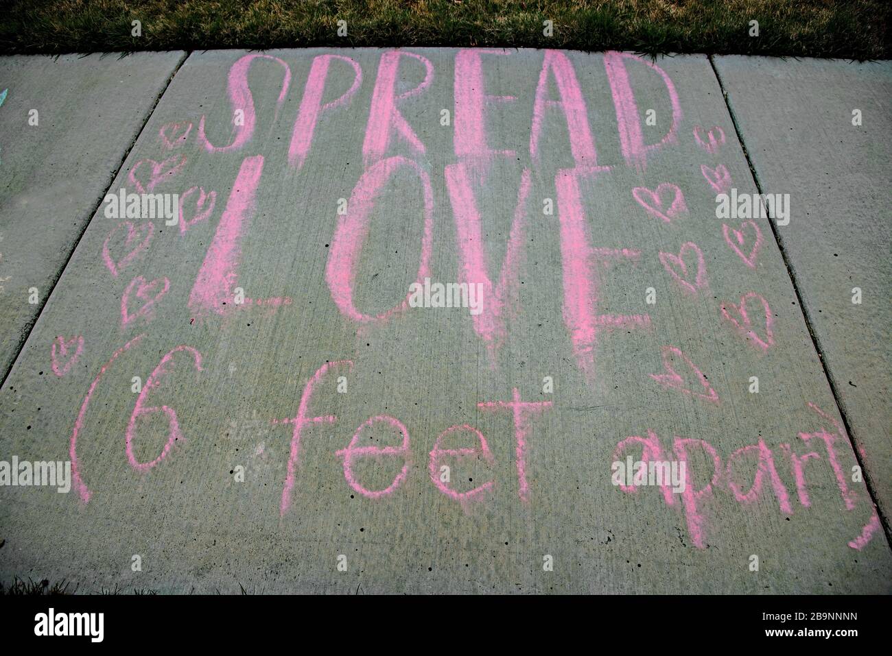 South Jordan, Utah, USA, March 24, 2020. Children's chalk art during the Covid19 Pandemic