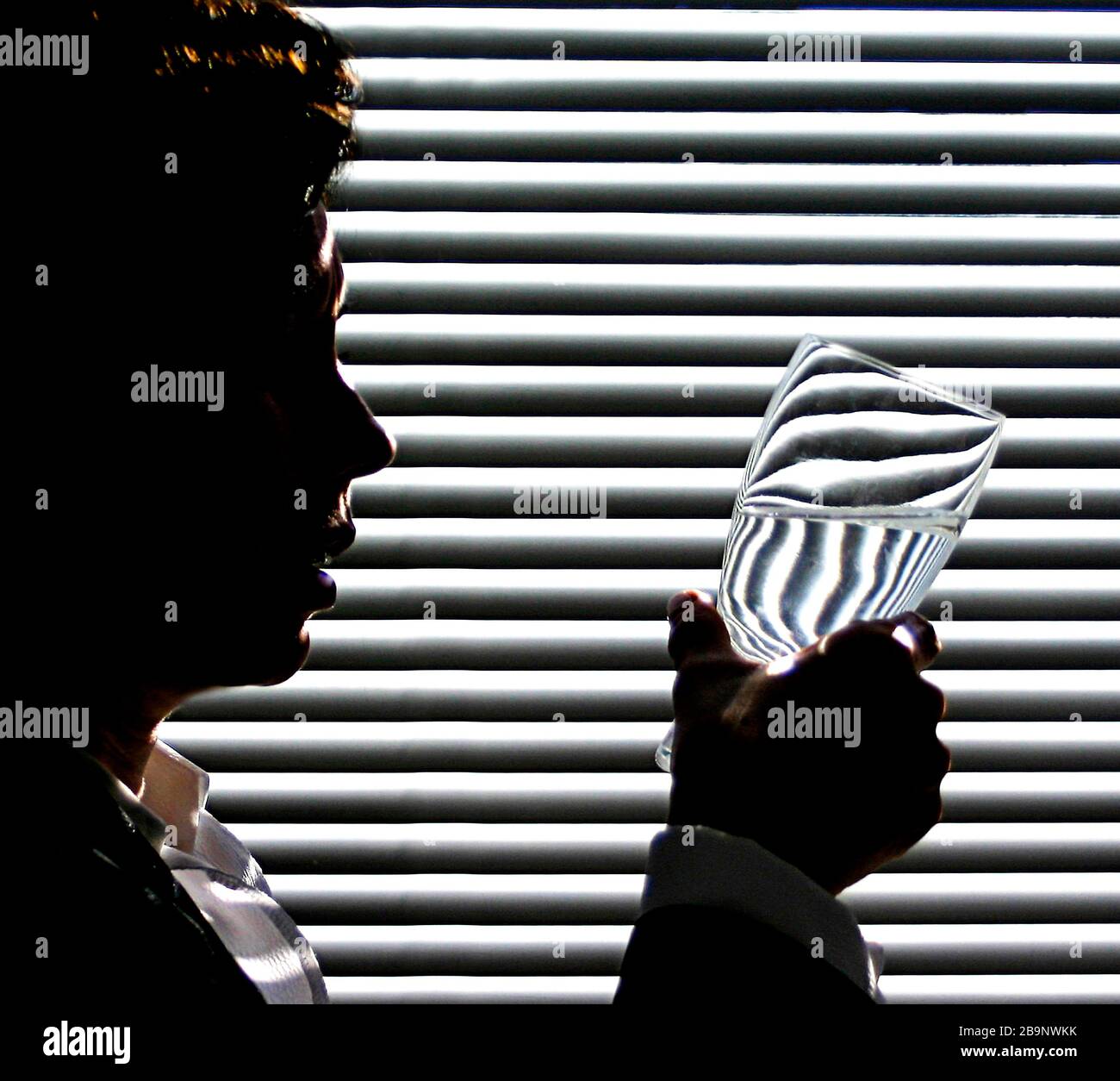 A woman with glass of water Stock Photo