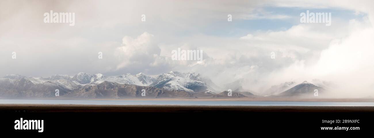 mountain landscape showing the typical Tian Shan mountains around Chatyr Kol lake in Kyrgyzstan Stock Photo