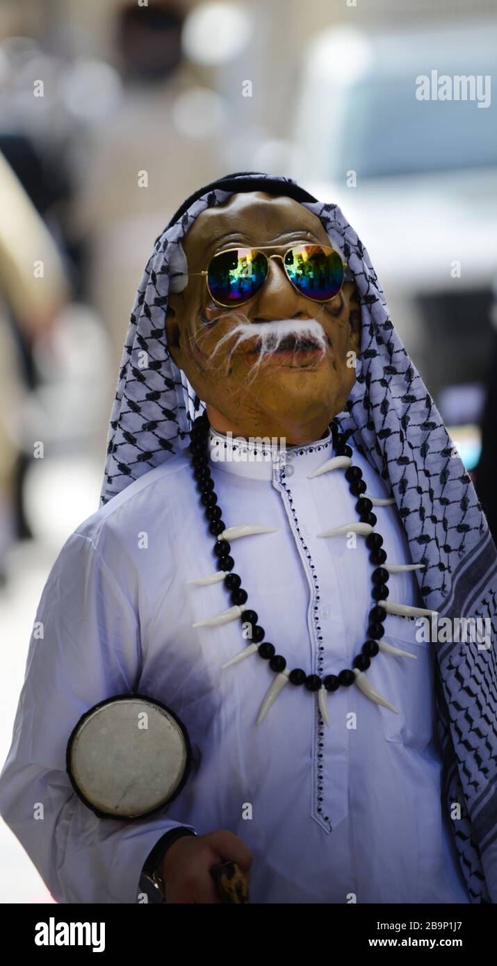 A Hasidic  Jewish boy dressed an an Arab man wearing a Keffiyeh during the Purim festival in Mea Shearim neighborhood in Jerusalem. Stock Photo