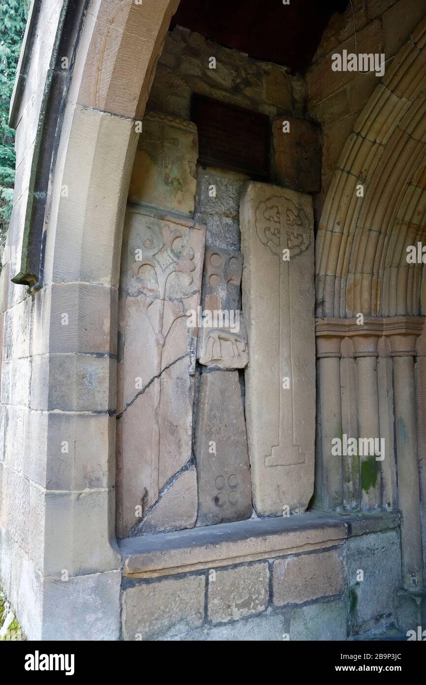 Stone coffin lids, St Helens church, Darley Dale, Derbyshire England UK Church entrance Stock Photo