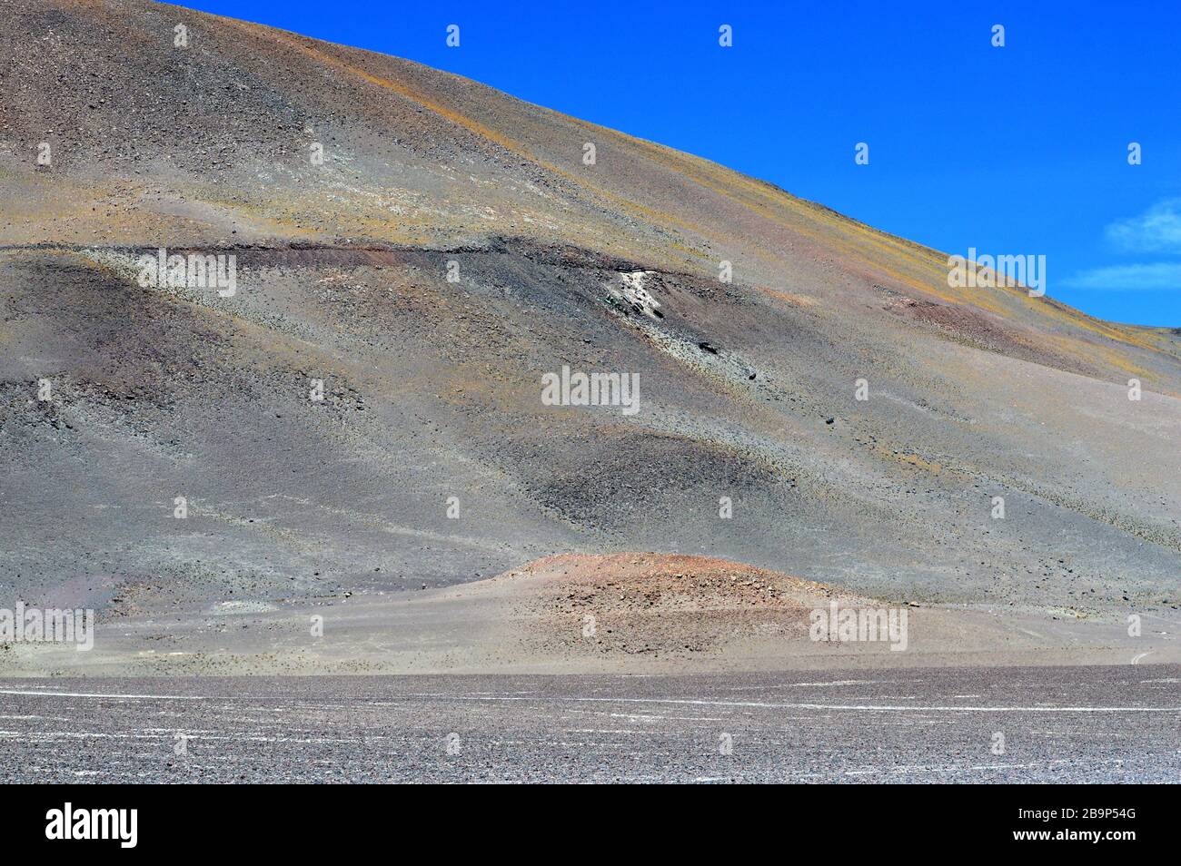 Remains of the railway accident in the 'train to the clouds' in 1996 front of the Socompa lagoon. Salta province, Argentina. Stock Photo