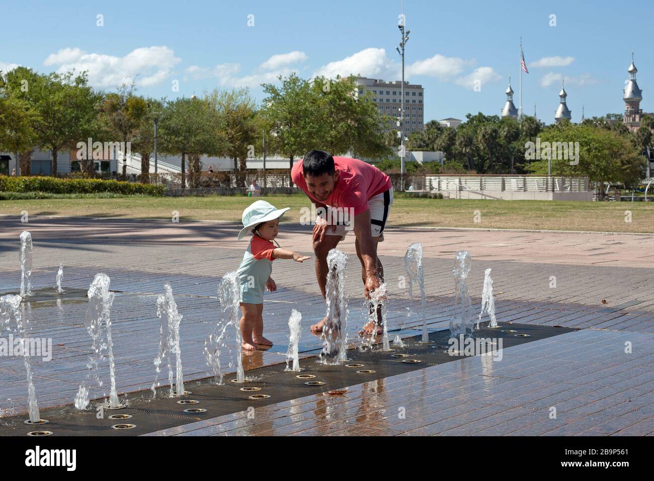 Water play is enjoyed by families at Curtis Hixon Waterfront Park in Tampa, Florida, USA. Stock Photo